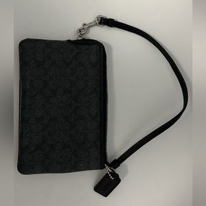 Coach wristlet. Never used. New